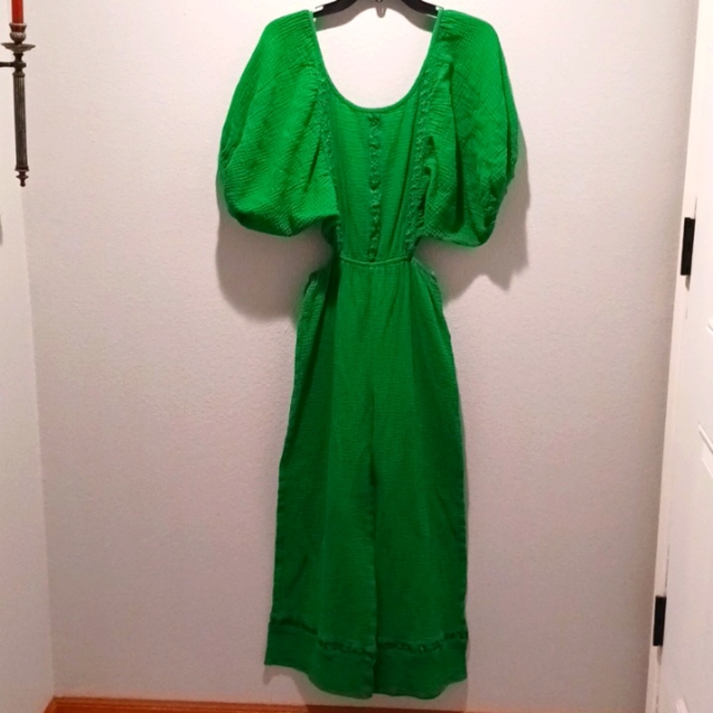 Open back, green jumpsuit